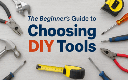Flat lay of beginner DIY tools including hammer, pliers, screwdrivers, wrench, measuring tape, and level on a light wood background with caption text “The Beginner’s Guide to Choosing DIY Tools” in bold blue and orange lettering.